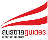 Badge officiel des  austriaguides. Porté par un guide en Autriche lors d'une visite de ville. Accréditation autrichienne.