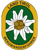 Badge officiel des guides de randonnée de la région du Tyrol, en Autriche.